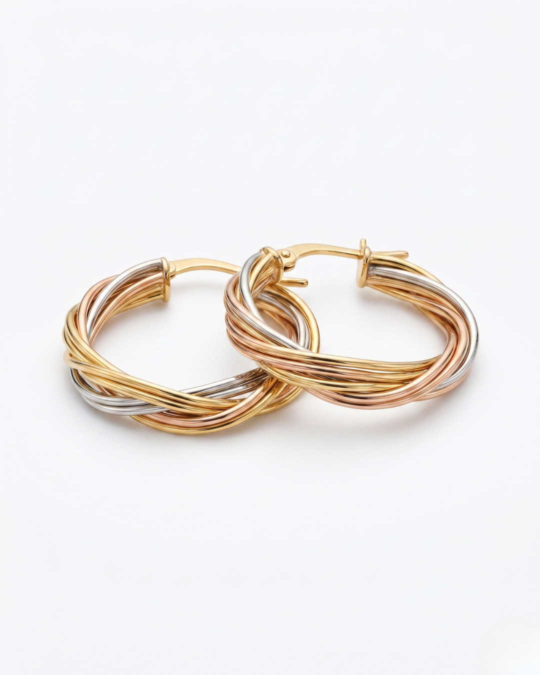 Aretes trenzados | Oro tricolor 10k